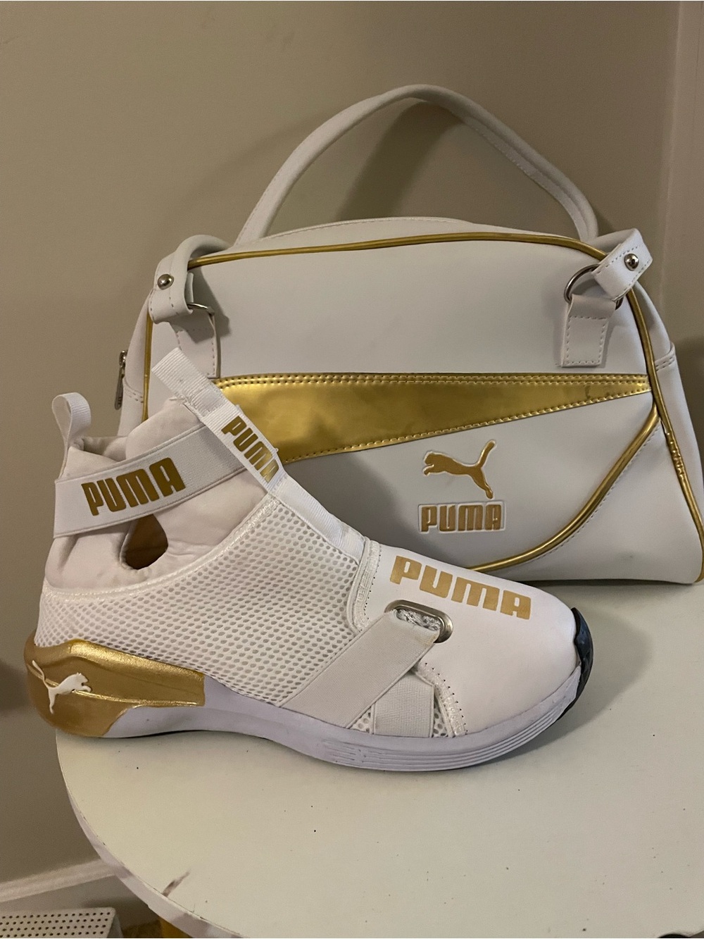 Puma Women's White & Gold Slip-On Athletic Trainer